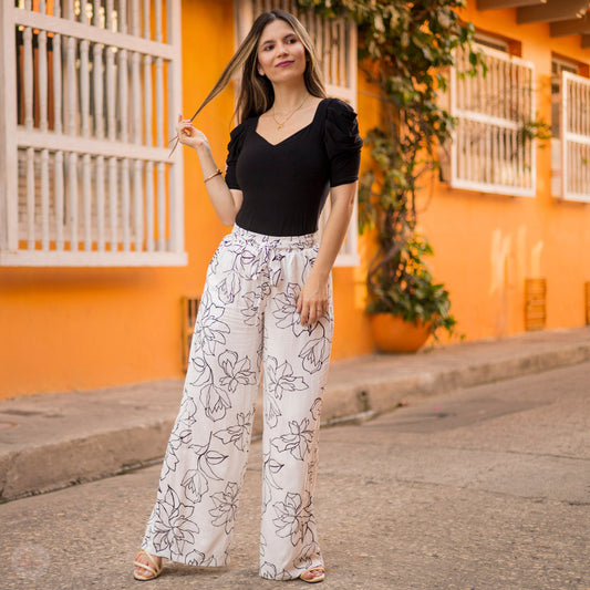 Pantalón Blanco con flores negras