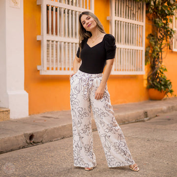 Pantalón Blanco con flores negras