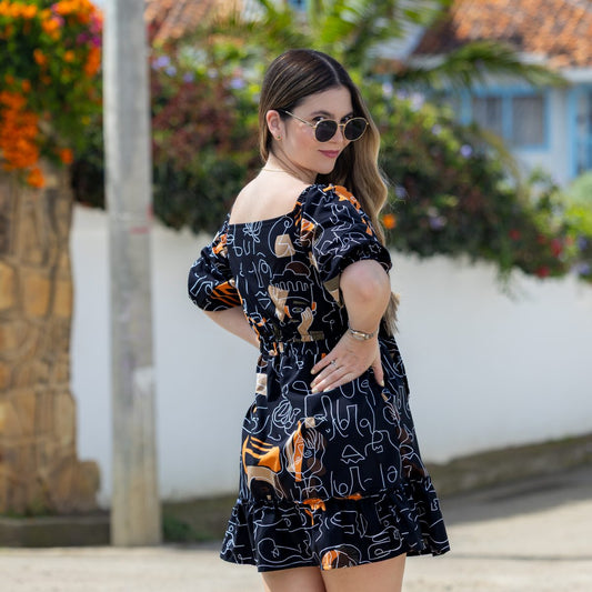 vestido negro con caras